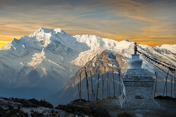 stupa and annapurna mountain in annapurna region